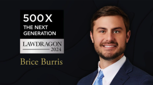 A man in a blue suit and tie stands next to a graphic that reads "500X The Next Generation Lawdragon 2024, Brice Burris, Best Lawyers in America" on a dark background.