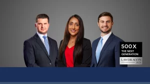 Three professionally dressed individuals stand side by side in front of a gray background, representing Fears Law Partners on the Lawdragon Next Generation List, with a "500X THE NEXT GENERATION LAWDRAGON 2025" graphic on the right.