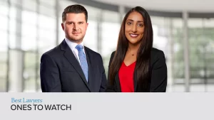 A man in a suit and a woman in business attire stand side by side in a modern office setting, representing Fears Law Partners, with the text "Best Lawyers in America Ones to Watch 2026" below.