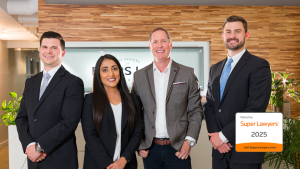 Four professionally dressed individuals stand in an office lobby, with a Texas Super Lawyers 2025 badge displayed in the lower right corner, highlighting All Fears Law Partners as Rising Stars in the legal field.
